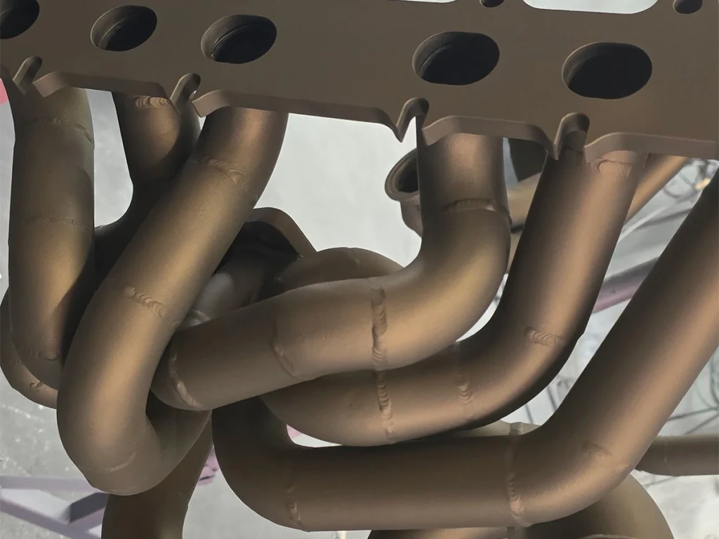 Coated exhaust headers with a bronze-colored finish